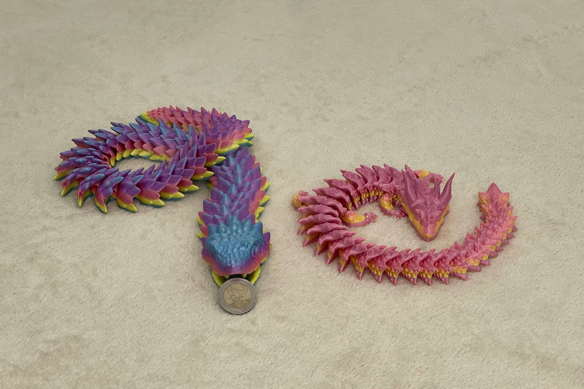 Articulated snake with movable jaw
